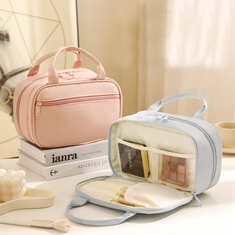 Neue tragbare Kosmetiktasche mit Griff Wasserdichte Make-up-Toilettenartikel Handtasche mit großer Kapazität Multifunktionale Aufbewahrungs-Reisetasche für Frauen