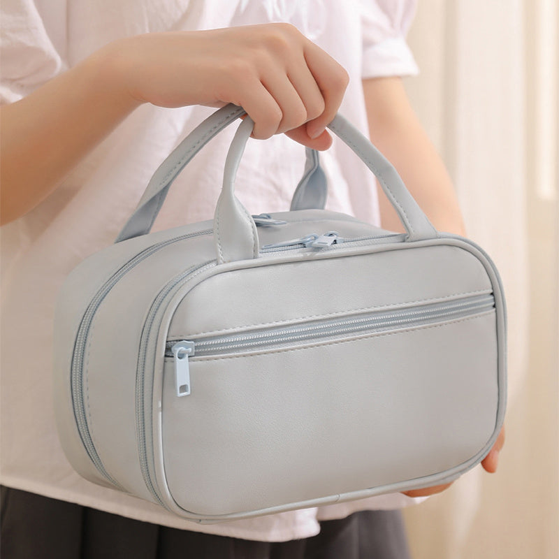 Neue tragbare Kosmetiktasche mit Griff Wasserdichte Make-up-Toilettenartikel Handtasche mit großer Kapazität Multifunktionale Aufbewahrungs-Reisetasche für Frauen