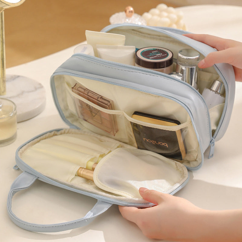 Neue tragbare Kosmetiktasche mit Griff Wasserdichte Make-up-Toilettenartikel Handtasche mit großer Kapazität Multifunktionale Aufbewahrungs-Reisetasche für Frauen